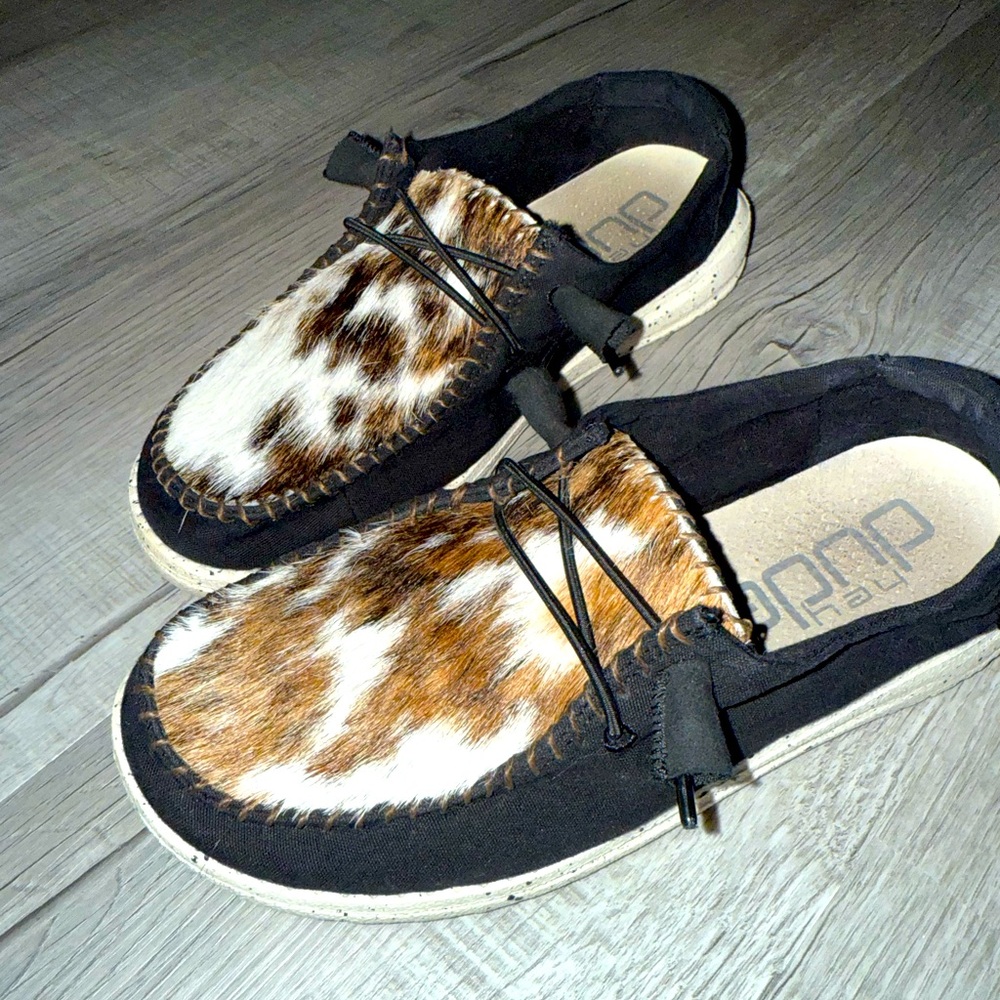 Custom made cowhide women’s hey dudes.